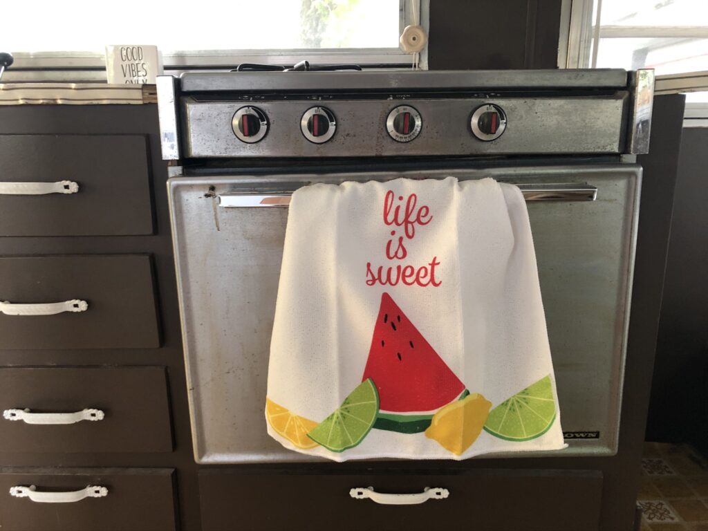 Hang a cute hand towel in the kitchen